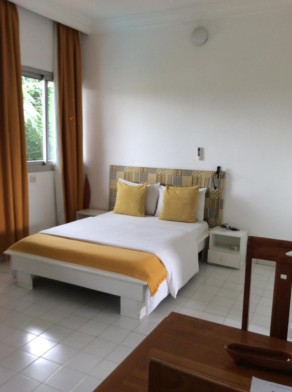 Residence Le Flamboyant Abidjan Bagian luar foto
