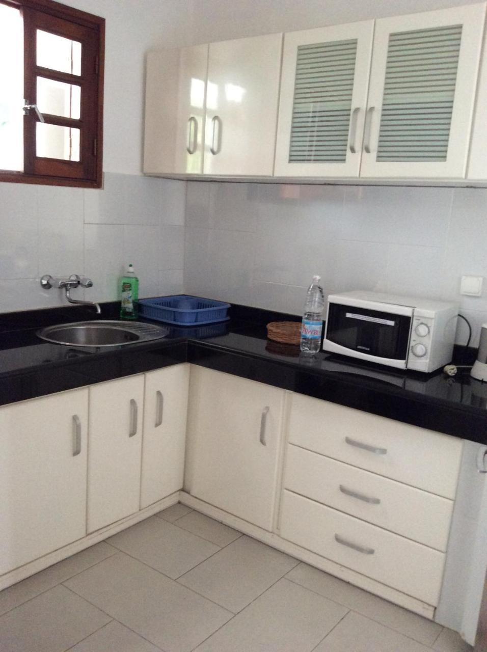 Residence Le Flamboyant Abidjan Bagian luar foto