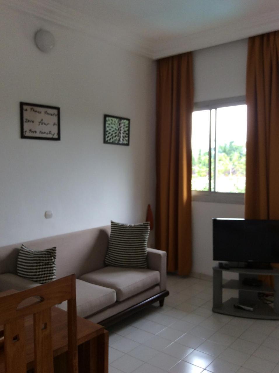 Residence Le Flamboyant Abidjan Bagian luar foto